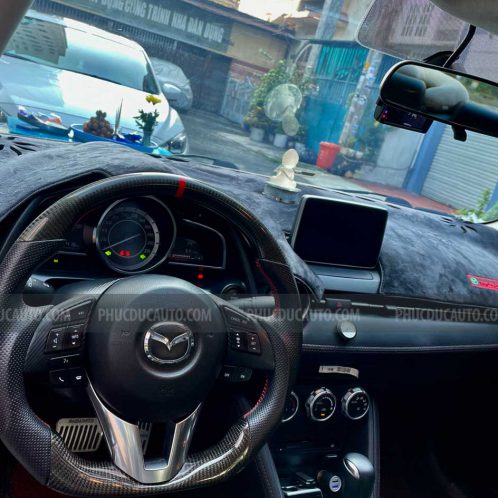 vô_lăng_carbon_mazda_2